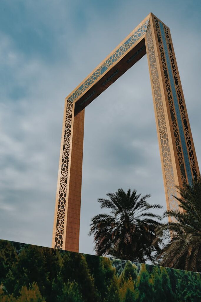 pexels-photo-3873672 From below exterior of creative contemporary construction build in shape of rectangular photo frame in Dubai UAE on clear hot day